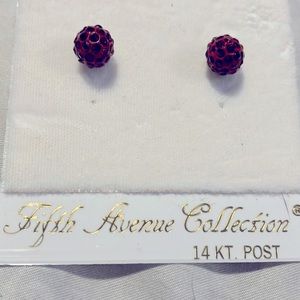 Red Swarovski crystal earrings with 14 my gold posts. 1/4 inch diameter
